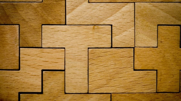 Wooden pieces represent clients segmented from NPS Quarterly Business Reviews (QBRs)